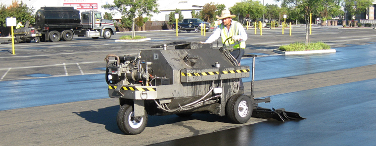 Sealcoating services for driveways roads and parking lots